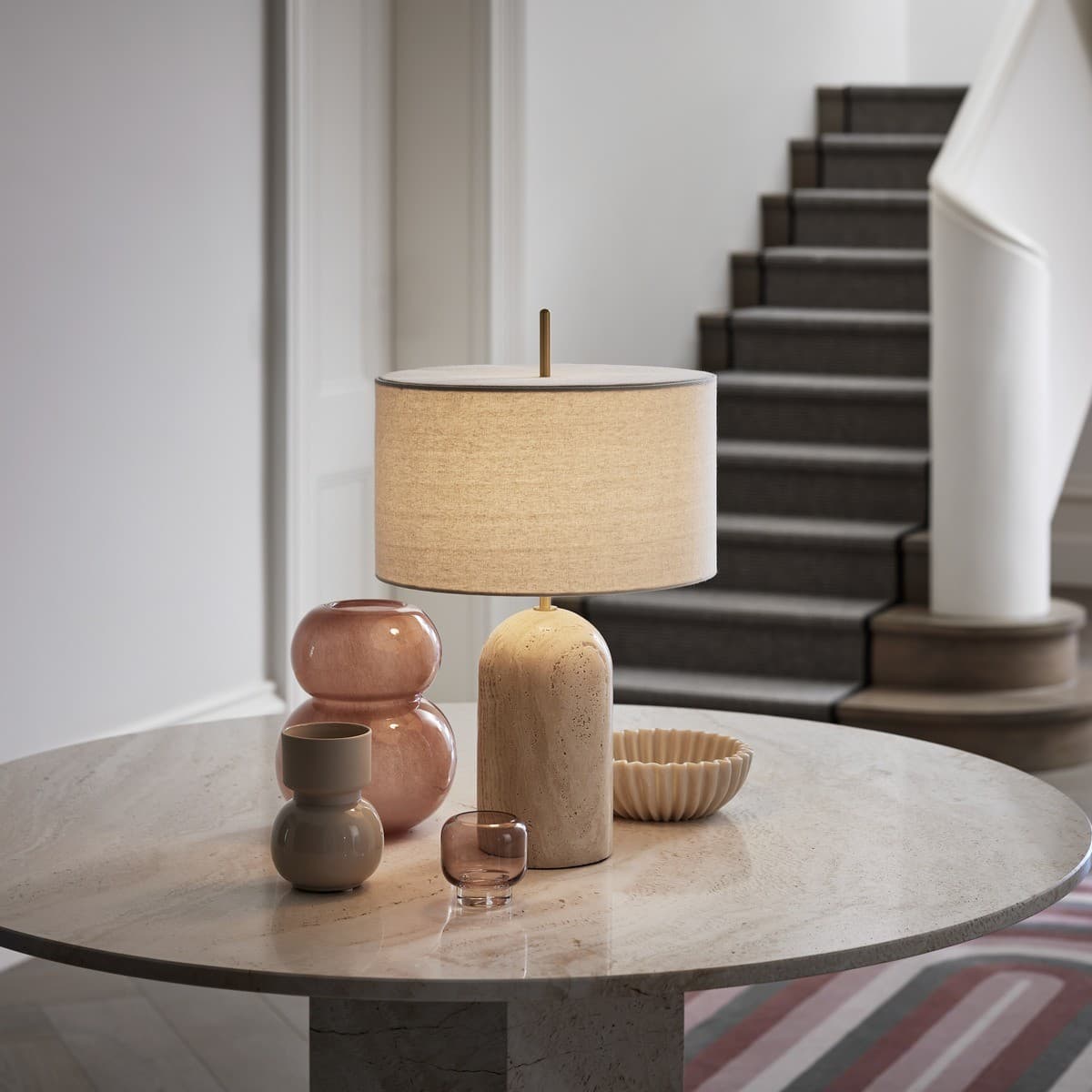 Made by Mayfair Rhodes 1 Light Table Lamp in Natural Travertine with Solid Brass Detail and Natural Linen Shade