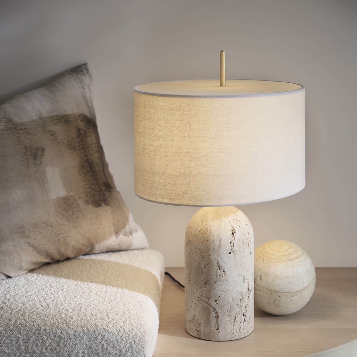 Made by Mayfair Rhodes 1 Light Table Lamp in Natural Travertine with Solid Brass Detail and Natural Linen Shade