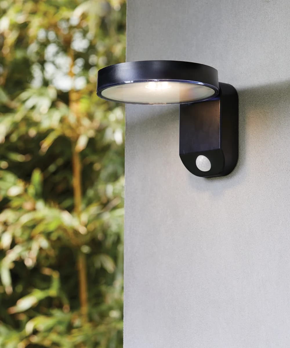 Sunset LED Round Wall Sconce with Sensor in Black | Beacon Lighting