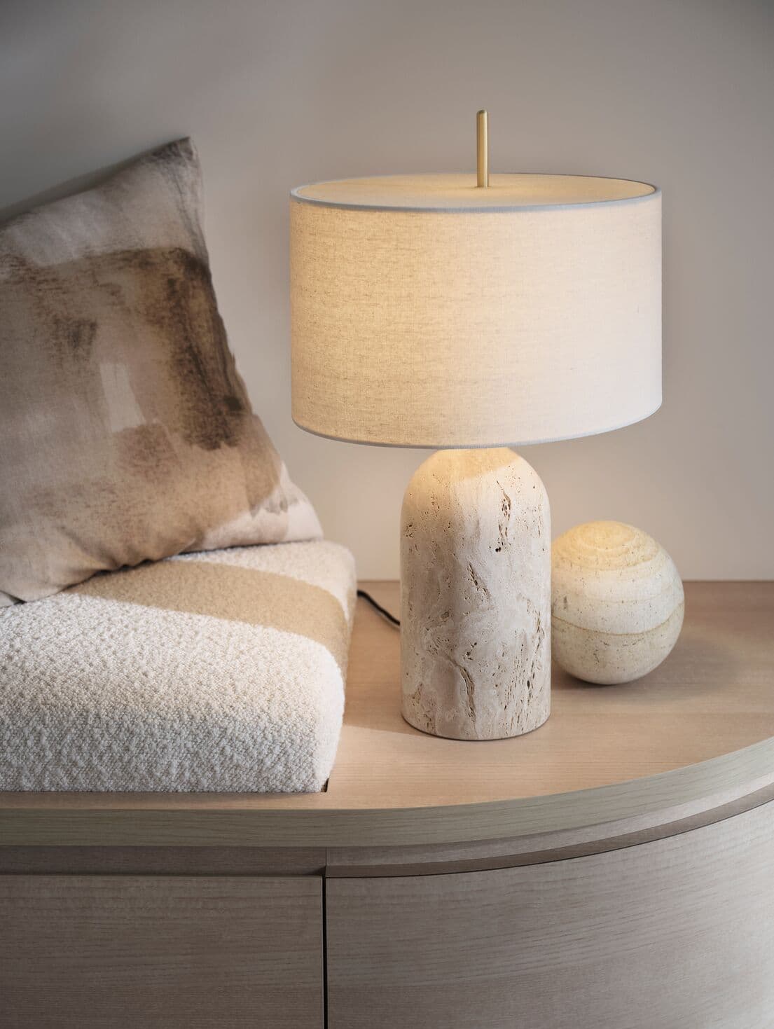 Made by Mayfair Rhodes 1 Light Table Lamp in Natural Travertine with Solid Brass Detail and Natural Linen Shade | Beacon Lighting